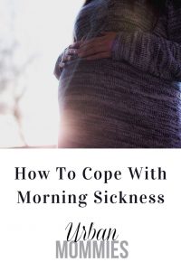 how to cope with morning sickness pregnant belly in a sweater