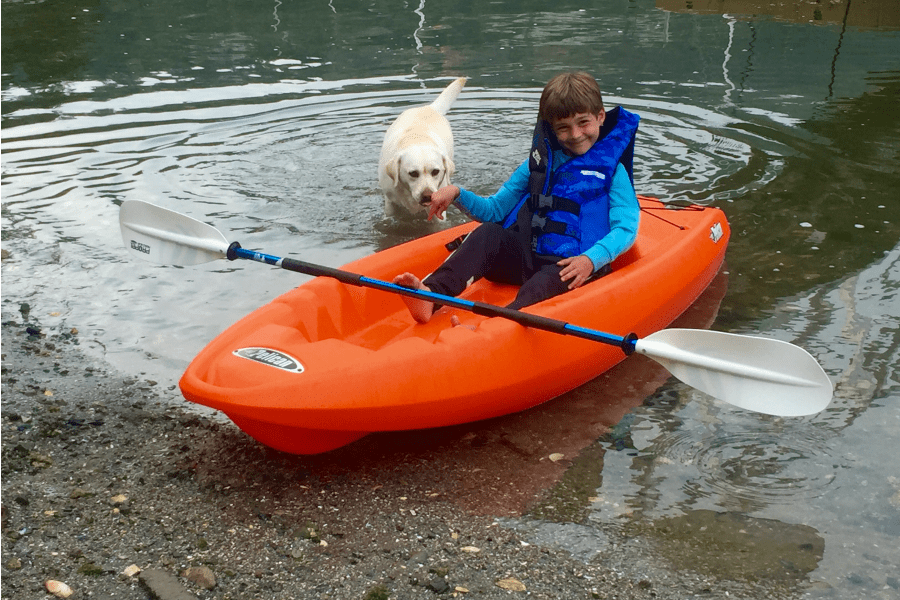 Dog Loves Kayak Boy