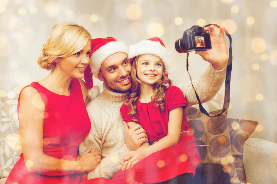 Taking a family photo for the best holiday photo gifts