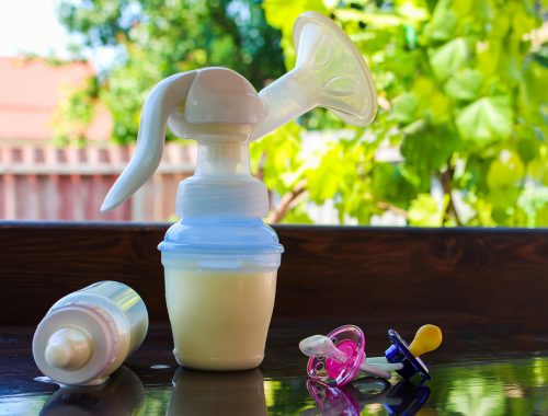 World Breast Pumping Day concept image of pump and baby items