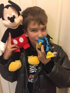 Liam enjoying his Scentsy Disney Products 
